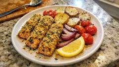 Crispy Baked Salmon Sticks with Sheet-Pan Potatoes and Cherry Tomatoes